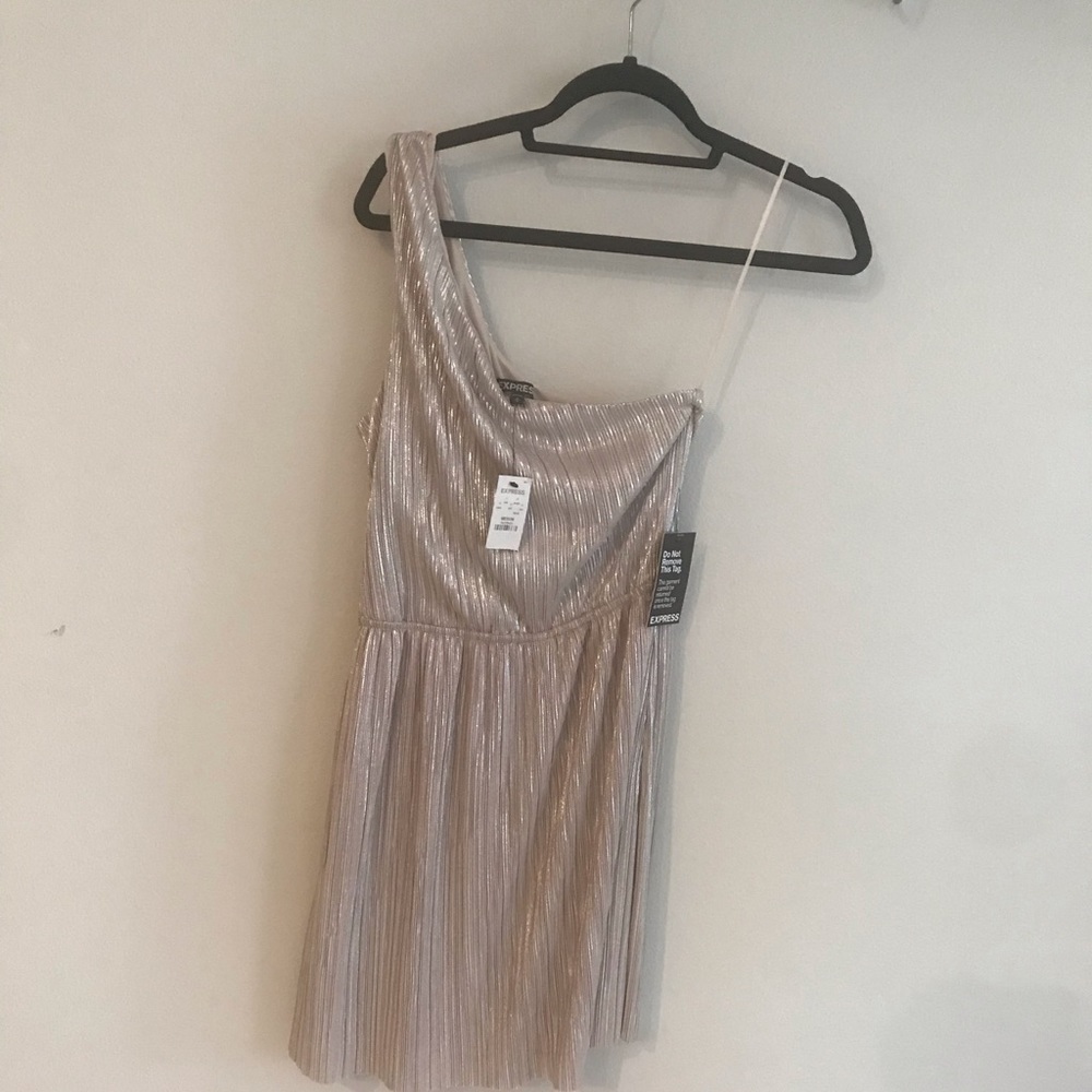 One shoulder gold mini dress.